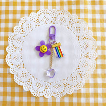 Load image into Gallery viewer, Purple Smiley Flower Keyring
