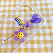 Load image into Gallery viewer, Purple Smiley Flower Keyring
