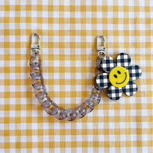 Load image into Gallery viewer, Checkered Smiley Flower Phone Case Chain
